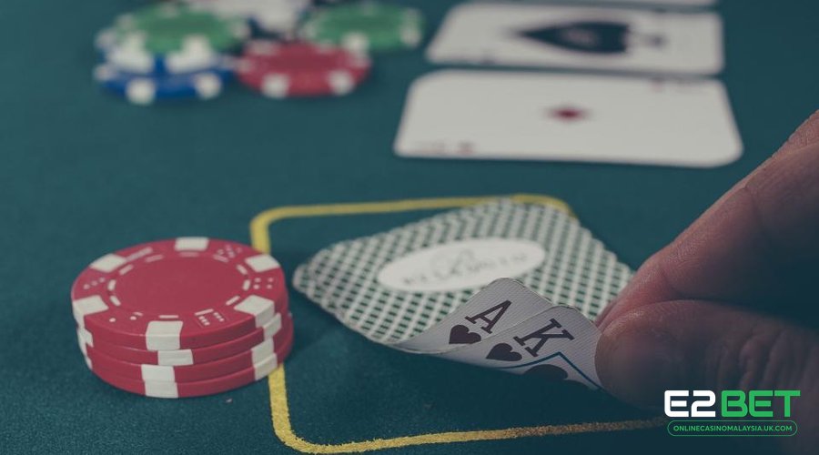 WM Casino Malaysia live baccarat table with chips at E2BET